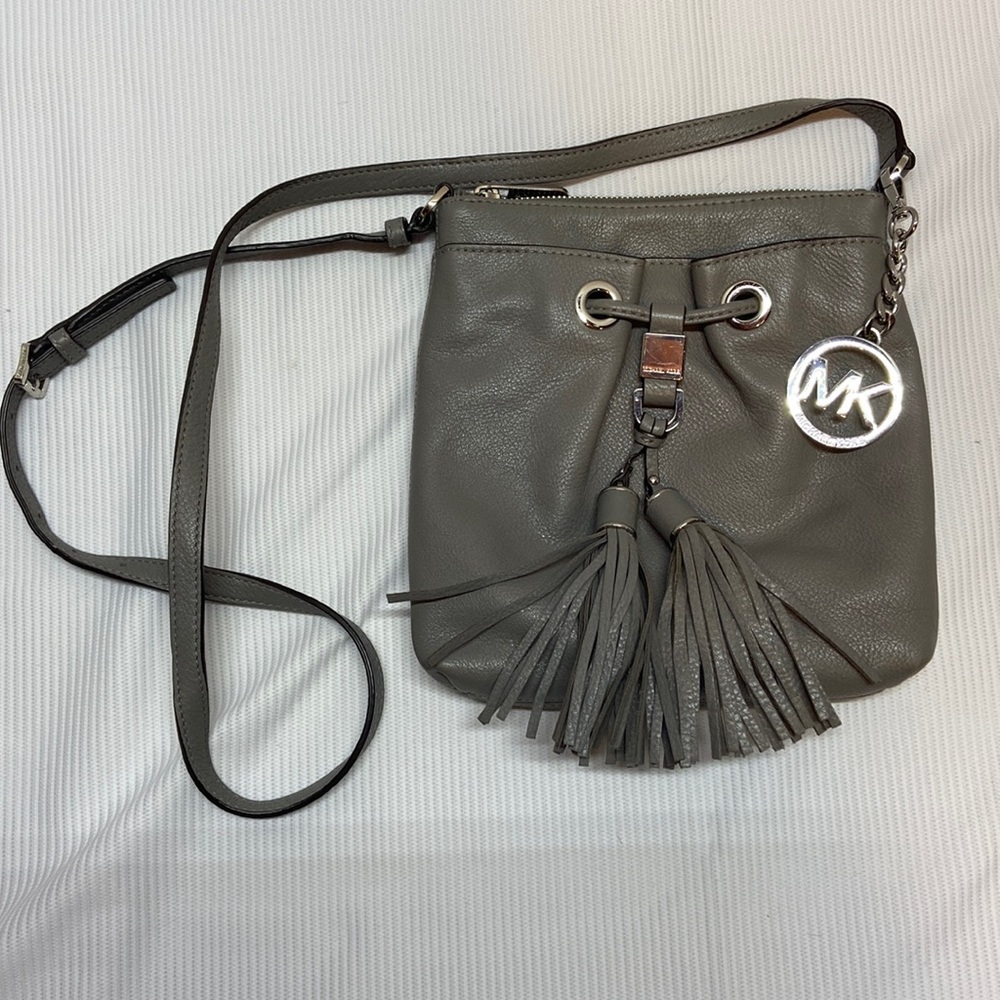 Michael Kors gray leather crossbody purse.